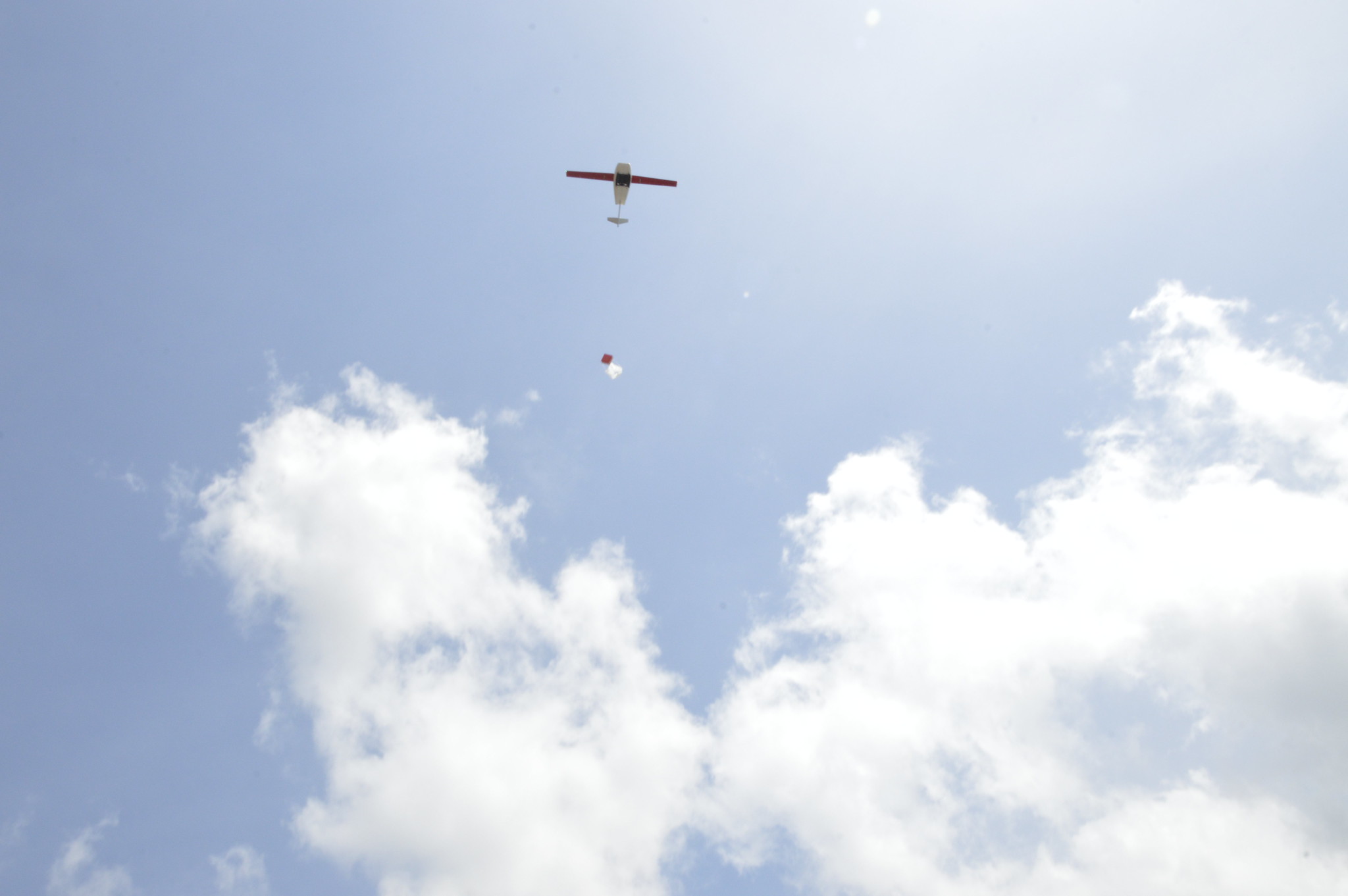 A Zipline drone delivers an artificial insemination kit for smallholder pig farmers in Gakenke district (photo credit: V37).